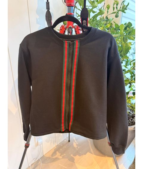 Closed front zipper and contrast striped trim on black jacket