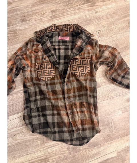 Rust charcoal and gray plaid button down flannel with brown geometric patterned chest pockets and collar