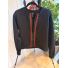 Front of black reworked zip jacket with red and green stripe trim